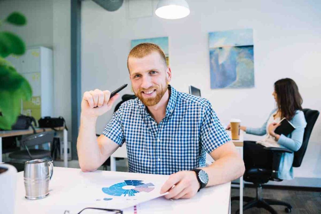 cheerful man with diagram 1